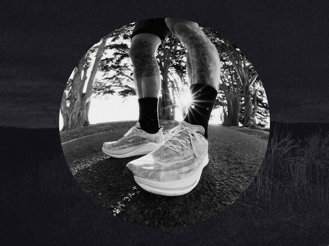 HOKA x JOHN ELLIOTT running shoes featured with a person on a path.