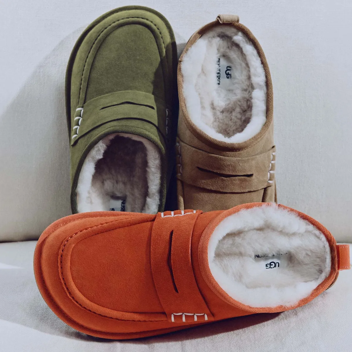 Three UGG JW Anderson Loafers in different colors.