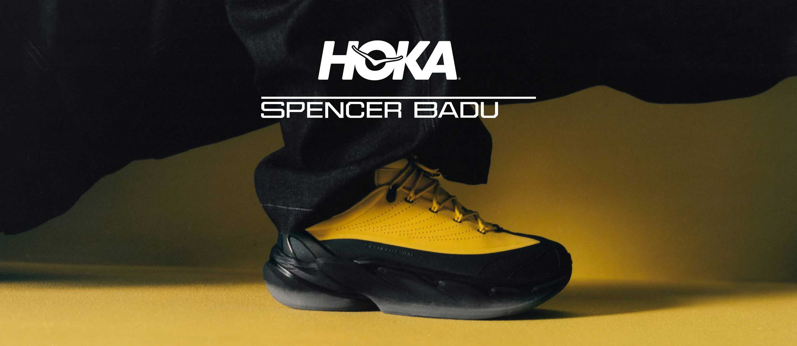 Logo Spencer Badu x Hoka avec les chaussures Spencer Badu x Hoka.