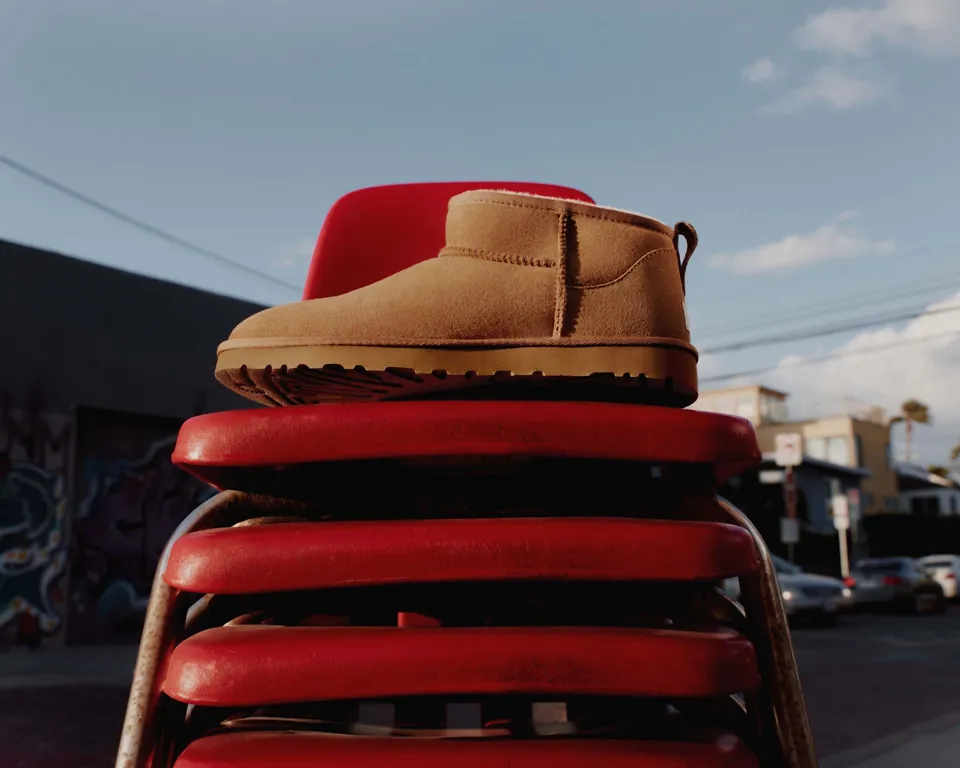 Our Classic Ultra Mini on top of stacked red chairs.